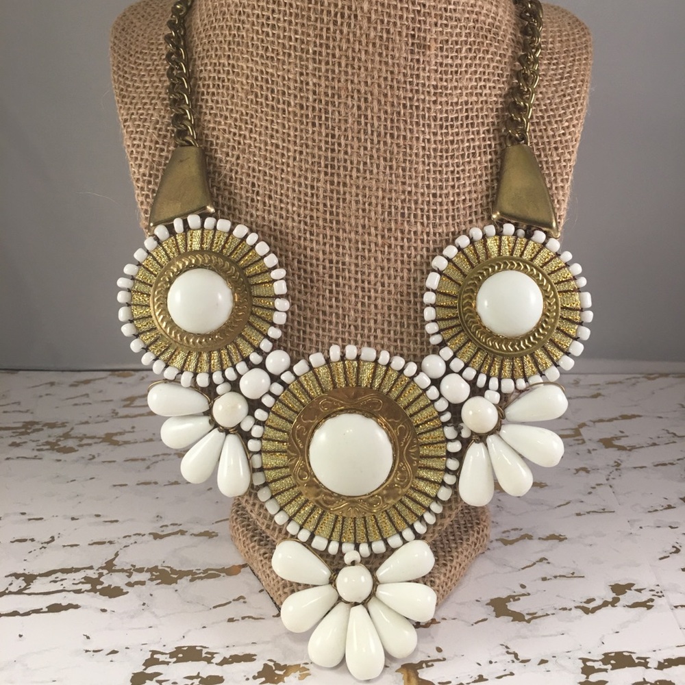 White and gold statement necklace.
